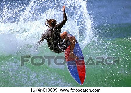 High angle view of a person surfing in the sea View Large Photo Image Stock Photo - High angle view of a person surfing in the sea. Fotosearch