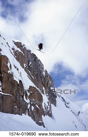 Low angle view of a person skiing View Large Photo Image Stock Image - Low angle view of a person skiing. Fotosearch