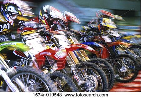 Motocross racing View Large Photo Image Stock Photo - Motocross racing. Fotosearch