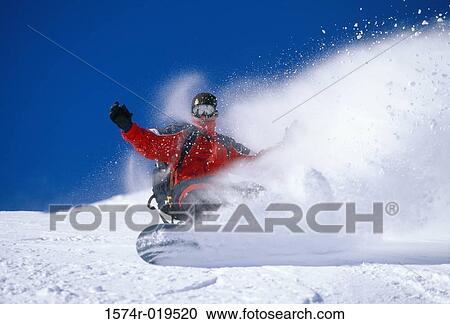 Person snowboarding downhill, Tignes, France View Large Photo Image Stock Image - Person snowboarding downhill, Tignes, France. Fotosearch