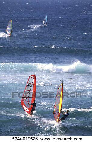 Windsurfers jumping waves, Hawaii, USA View Large Photo Image Stock Photograph - Windsurfers jumping waves, Hawaii, USA. Fotosearch