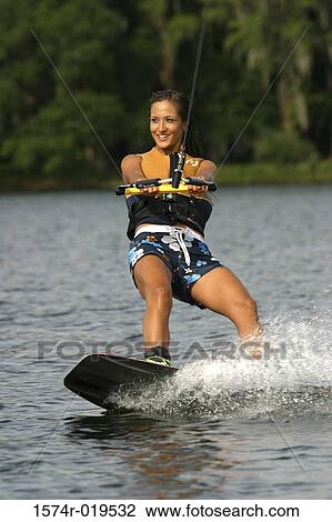 Young adult woman wakeboarding, Florida, USA View Large Photo Image Stock Image - Young adult woman wakeboarding, Florida, USA. Fotosearch