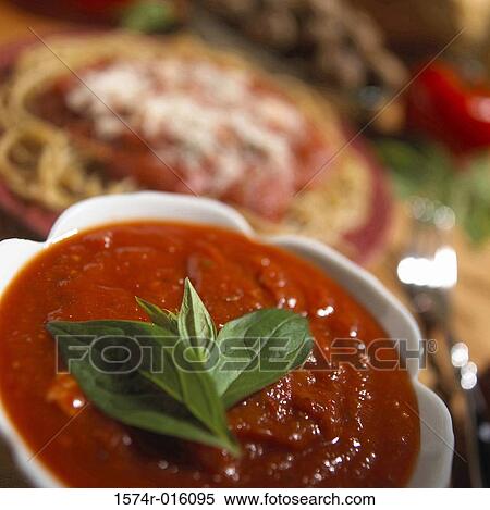 Stock Photography - Close-up of a tomato based sauce in a bowl. Fotosearch