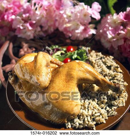 Close-up of chicken and rice on a plate View Large Photo Image Stock Image - Close-up of chicken and rice on a plate. Fotosearch
