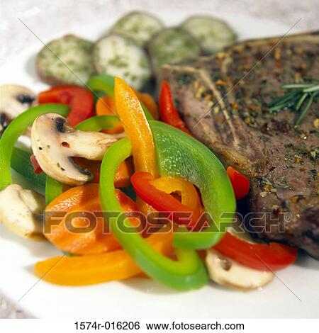 Stock Photograph - Close-up of veal chop on a plate. Fotosearch