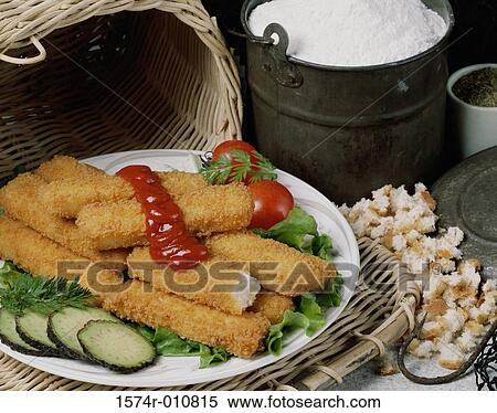 Fried fish sticks with sauce in a plate View Large Photo Image Stock Photography - Fried fish sticks with sauce in a plate. Fotosearch