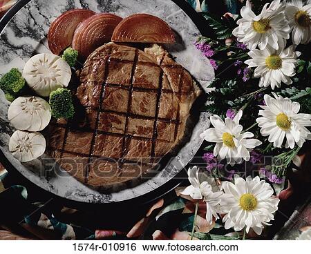 Grilled steak on a plate View Large Photo Image Stock Photograph - Grilled steak on a plate. Fotosearch