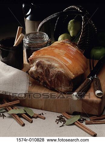Stock Photo - Ham on a cutting board. Fotosearch