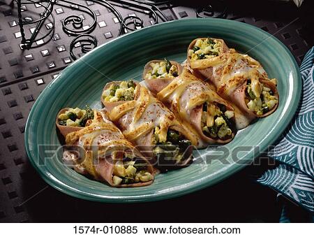 Stock Photography - Ham wrapped with vegetables and cheese. Fotosearch