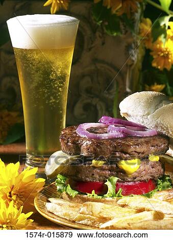 Stock Photo - Hamburger and a glass of beer. Fotosearch