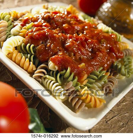 High angle view of tomato sauce on pasta View Large Photo Image Stock Image - High angle view of tomato sauce on pasta. Fotosearch