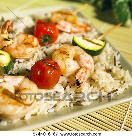 Stock Photo - Shrimp Skewers and Rice. Fotosearch
