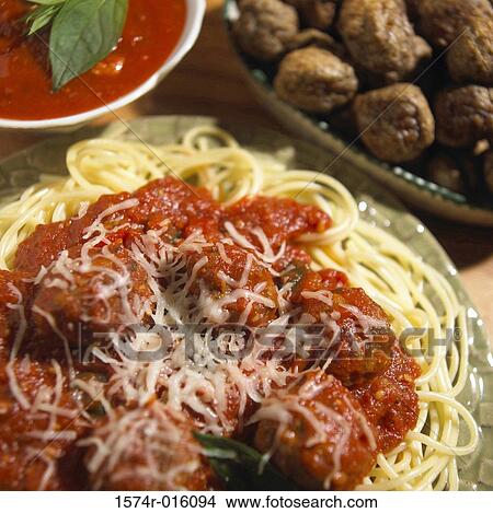 Spaghetti and meatballs with sauce View Large Photo Image Picture - Spaghetti and meatballs with sauce. Fotosearch