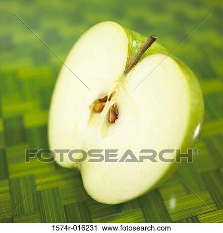 Close-up of a slice of Granny Smith Apple View Large Photo Image Stock Image - Close-up of a slice of Granny Smith Apple. Fotosearch