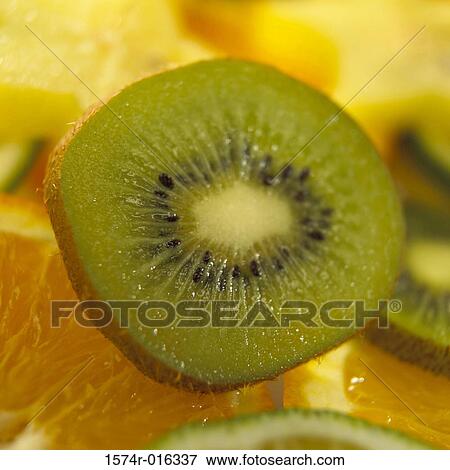 Stock Photo - Close-up of a slice of kiwi. Fotosearch