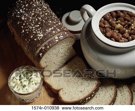 Stock Photo - Close-up of brown bread with beans. Fotosearch