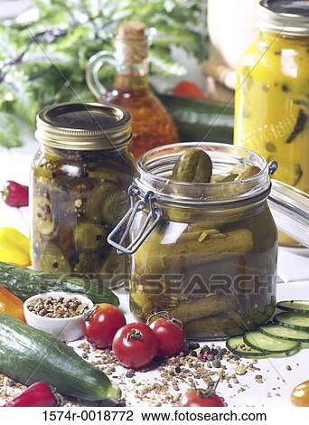 Close-up of pickles in the jar View Large Photo Image Stock Image - Close-up of pickles in the jar. Fotosearch