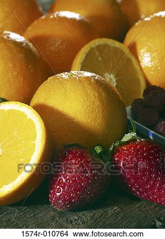 Picture - Oranges and strawberries. Fotosearch