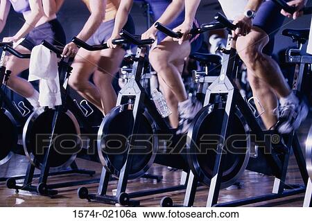 Group of people exercising in a health club View Large Photo Image Stock Image - Group of people exercising in a health club. Fotosearch