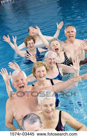 Group of senior people performing water aerobics in a swimming pool View Large Photo Image Stock Photography - Group of senior people performing water aerobics in a swimming pool. Fotosearch