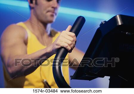 Young man exercising View Large Photo Image Picture - Young man exercising. Fotosearch