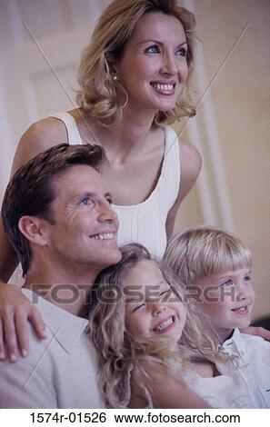 Parents and their children looking ahead View Large Photo Image Stock Photograph - Parents and their children looking ahead. Fotosearch