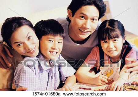 Portrait of a couple with their son and daughter View Large Photo Image Stock Image - Portrait of a couple with their son and daughter. Fotosearch