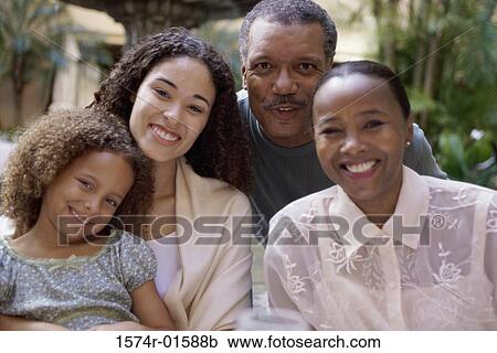 Portrait of a family smiling View Large Photo Image Stock Image - Portrait of a family smiling. Fotosearch