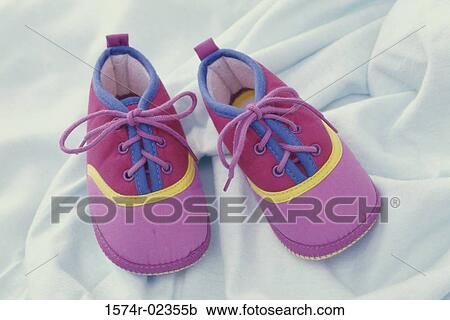 Close-up of a pair of baby booties View Large Photo Image Stock Image - Close-up of a pair of baby booties. Fotosearch
