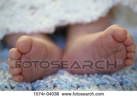 Close-up of the soles of a baby's feet View Large Photo Image Stock Photo - Close-up of the soles of a baby's feet. Fotosearch