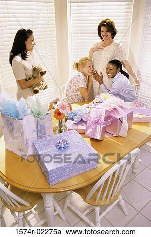 Group of young women at a baby shower View Large Photo Image Stock Image - Group of young women at a baby shower. Fotosearch