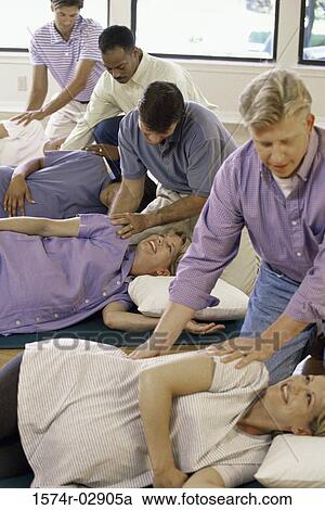 Husbands and their pregnant wives at a prenatal class View Large Photo Image Stock Image - Husbands and their pregnant wives at a prenatal class. Fotosearch