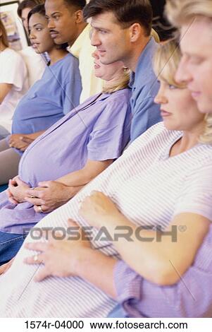 Husbands and their pregnant wives at a prenatal class View Large Photo Image Stock Image - Husbands and their pregnant wives at a prenatal class. Fotosearch