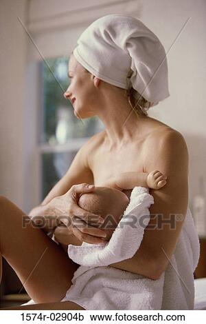Mother breastfeeding her baby boy View Large Photo Image Stock Image - Mother breastfeeding her baby boy. Fotosearch