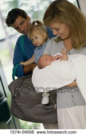 Stock Photograph - Parents with their children. Fotosearch