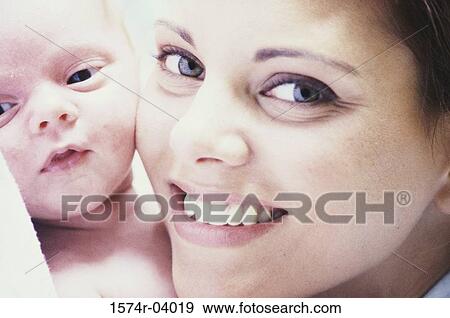 Stock Photo - Portrait of a mother with her baby boy. Fotosearch