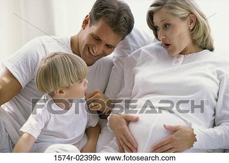 Pregnant woman with her husband and son View Large Photo Image Stock Image - Pregnant woman with her husband and son. Fotosearch