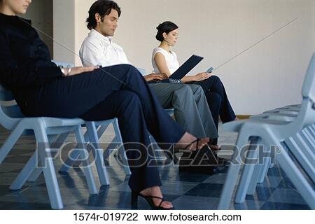Side profile of three business executives sitting in a row View Large Photo Image Stock Image - Side profile of three business executives sitting in a row. Fotosearch