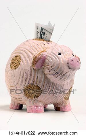 Close-up of a piggy bank with money in its slot View Large Photo Image Stock Image - Close-up of a piggy bank with money in its slot. Fotosearch