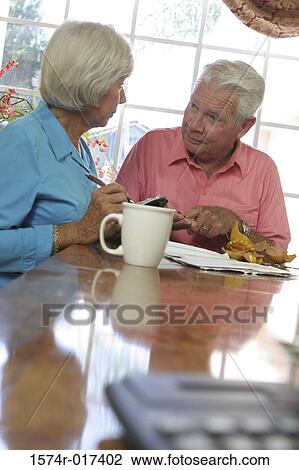 Senior couple looking at each other View Large Photo Image Stock Image - Senior couple looking at each other. Fotosearch