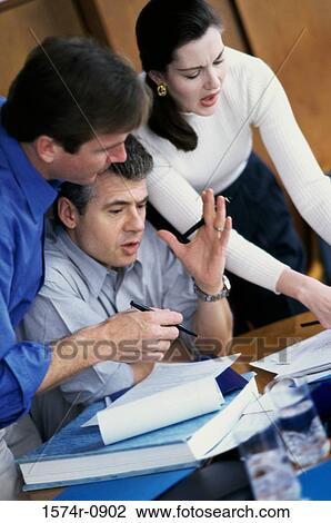 Business executives in a meeting View Large Photo Image Stock Image - Business executives in a meeting. Fotosearch