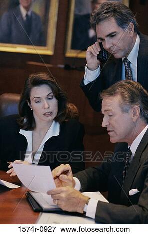 Business executives in a meeting View Large Photo Image Stock Photo - Business executives in a meeting. Fotosearch