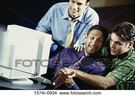 Businessmen together in an office View Large Photo Image Picture - Businessmen together in an office. Fotosearch