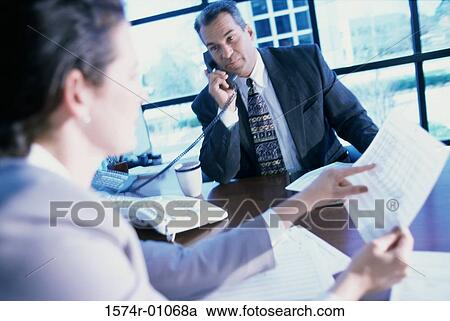 Close-up of a businesswoman in a meeting View Large Photo Image Stock Image - Close-up of a businesswoman in a meeting. Fotosearch