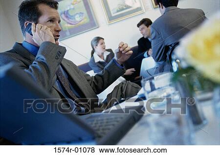 Group of business executives talking View Large Photo Image Stock Photo - Group of business executives talking. Fotosearch