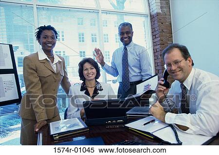 Portrait of a group of business executives in a meeting View Large Photo Image Stock Photography - Portrait of a group of business executives in a meeting. Fotosearch