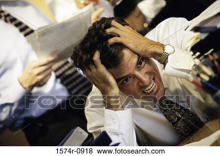 Young businessman holding his head in frustration View Large Photo Image Stock Photo - Young businessman holding his head in frustration. Fotosearch