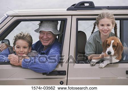 Portrait of a grandfather smiling with his grandson and granddaughter in a car View Large Photo Image Stock Image - Portrait of a grandfather smiling with his grandson and granddaughter in a car. Fotosearch