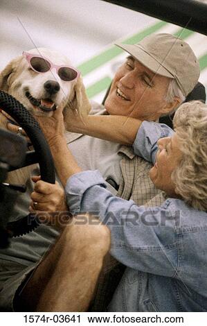 Senior couple with their dog View Large Photo Image Stock Image - Senior couple with their dog. Fotosearch