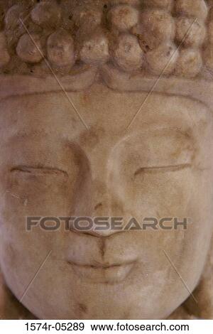 Close-up of a Buddha statue, China View Large Photo Image Stock Photo - Close-up of a Buddha statue, China. Fotosearch